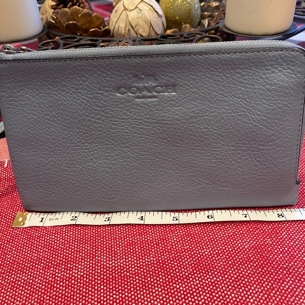 Flawless, baby blue leather, large Coach wristlet.